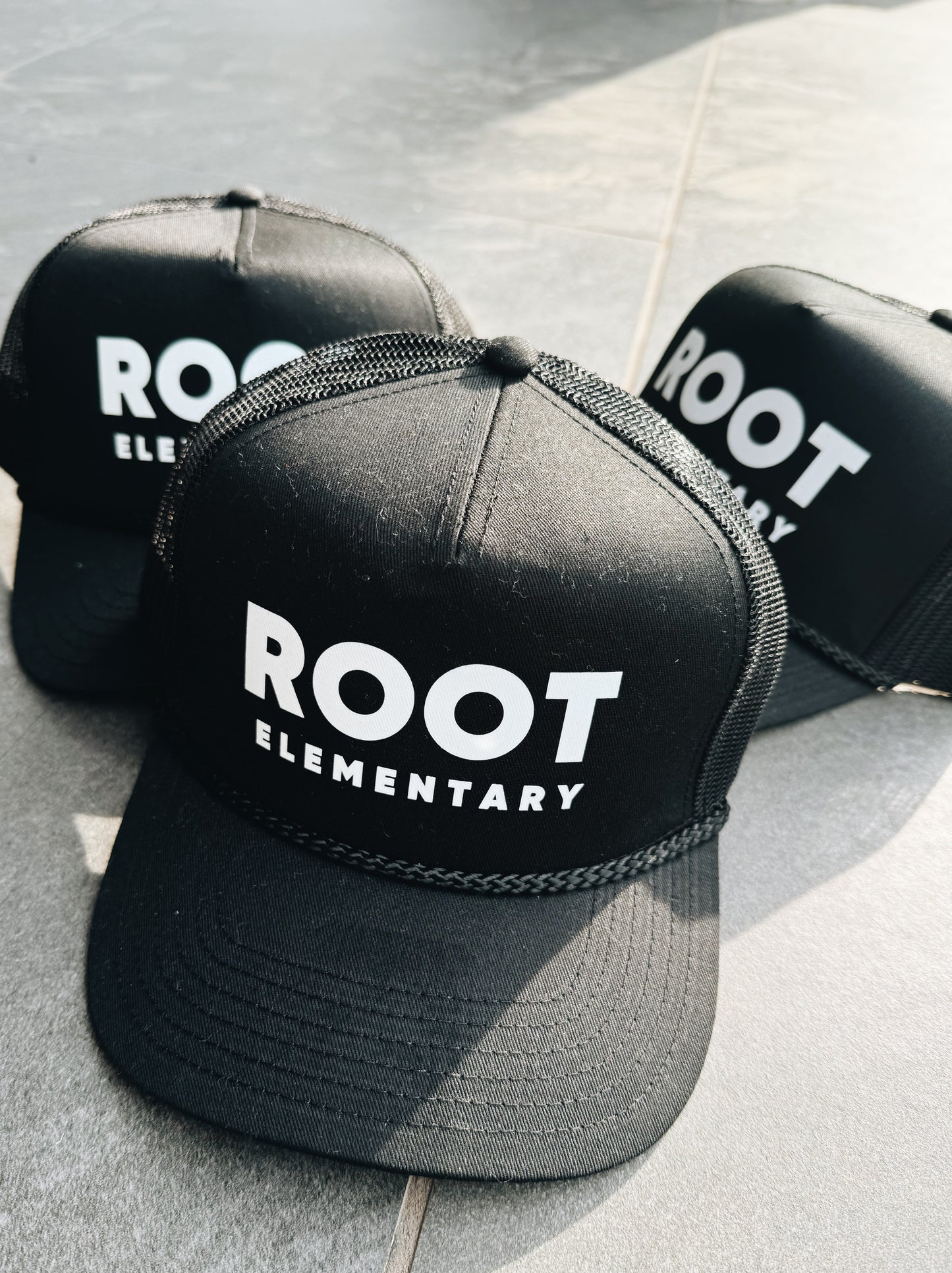 Root Elementary Trucker Hat